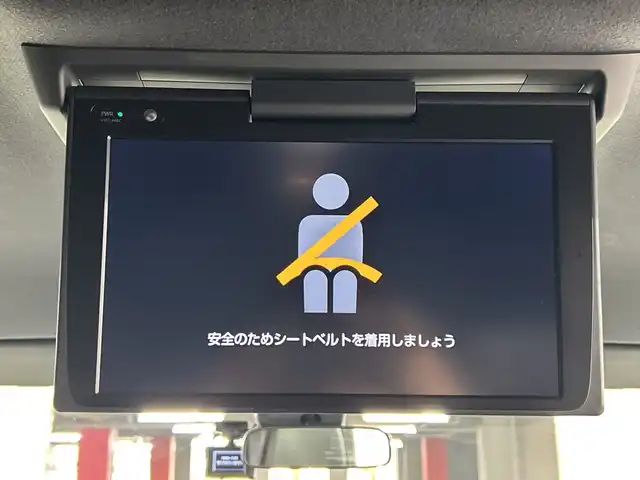 トヨタ ヴォクシー ZS 煌Ⅲ 愛知県 2021(令3)年 5.7万km イナズマスパーキングブラックガラスフレーク 禁煙車/純正10インチナビ/（CD/DVD/Bluetooth/フルセグTV/USB/HDMI)/バックカメラ/フリップダウンモニター/トヨタセーフティセンス/・プリクラッシュセーフティ/・レーンディパーチャーアラート/・オートマチックハイビーム/・パーキングサポートブレーキ/・クリアランスソナー/クルーズコントロール/ETC2.0/前後ドライブレコーダー/ハーフレザーシート/両側パワースライドドア/アイドリングストップ/純正16インチアルミホイール/スマートキー/スペアキー1本/プッシュスタート/LEDヘッドライト/フロントフォグランプ/オートライト/横滑り防止装置/フロアマット/電動格納ミラー