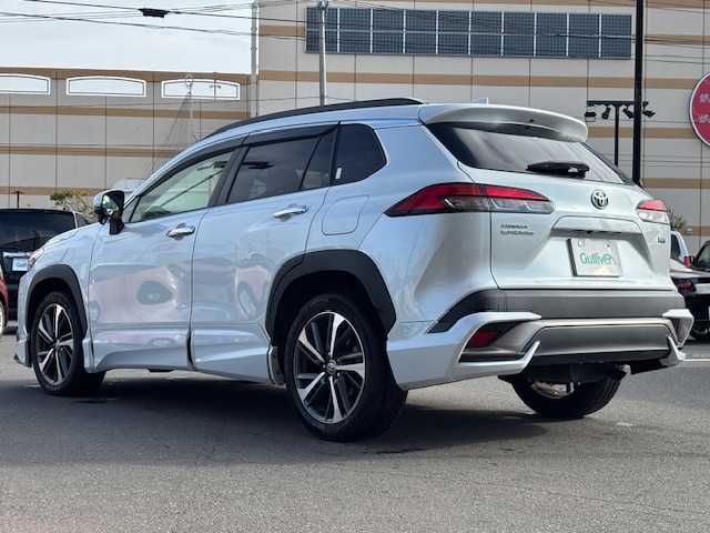 トヨタ カローラ クロス ハイブリッド Z 宮城県 2022(令4)年 5.2万km プラチナホワイトパールマイカ 登録時走行距離52043km/AppleCarPlay/FM/AM/Bluetooth/車線逸脱機能/横滑り防止装置/衝突軽減ブレーキ/コーナーセンサー/トヨタセーフティセンス/レーンディパーチャーアラート/バックカメラ/シートヒーター/ビルトインETC/ドライブレコーダー/電動パーキングブレーキ/純正アルミホイール/純正フロアマット/シートヒーター/ガラスルーフ/ドライブレコーダー/LEDライト