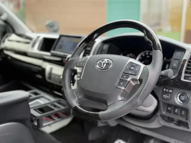 トヨタ ハイエース ファインテックツアラー 香川県 2022(令4)年 0.7万km ブラックマイカ アルパイン8インチSDナビ/フルセグ/CD/DVD/BT/applecarplay/androidAuto/フリップダウンモニター/RAYS VOLK RACING18インチアルミ/パノラミックビューモニター/デジタルインナーミラー/両側パワースライドドア/トヨタセーフティセンス/プリクラッシュセーフティ/オートハイビーム/コーナーセンサー /革調シートカバー/社外スピーカー/スマートキー/ローダウン/ETC