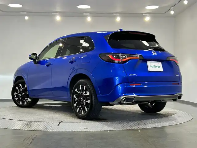 ホンダ ＺＲ－Ｖ ハイブリッド e:HEV Z 愛知県 2023(令5)年 1.2万km プレミアムクリスタルブルークリスタル 純正９型ホンダコネクトナビ　/(FM/AM/USB/Bluetooth/フルセグTV/スマホ連載）/ＢＯＳＥサウンド　/アラウンドビューモニター　/ホンダセンシング　/　　-衝突軽減ブレーキ（CNBS)/　　-誤発進抑制機能/　　-路線逸脱抑制機能/　　-アダプティブクルーズコントロール（ACC)/　　-先行車発進お知らせ機能/　　-標識認識機能/　　-オートハイビーム/　　-ブラインドスポットモニター/　　-パーキングセンサー/ステアリングヒーター　/茶革シート　/ビルトインＥＴＣ２．０　/電動バックドア　/メモリー付パワーシート　/シートヒーター/LEDヘッドライト