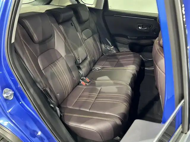 ホンダ ＺＲ－Ｖ ハイブリッド e:HEV Z 愛知県 2023(令5)年 1.2万km プレミアムクリスタルブルークリスタル 純正９型ホンダコネクトナビ　/(FM/AM/USB/Bluetooth/フルセグTV/スマホ連載）/ＢＯＳＥサウンド　/アラウンドビューモニター　/ホンダセンシング　/　　-衝突軽減ブレーキ（CNBS)/　　-誤発進抑制機能/　　-路線逸脱抑制機能/　　-アダプティブクルーズコントロール（ACC)/　　-先行車発進お知らせ機能/　　-標識認識機能/　　-オートハイビーム/　　-ブラインドスポットモニター/　　-パーキングセンサー/ステアリングヒーター　/茶革シート　/ビルトインＥＴＣ２．０　/電動バックドア　/メモリー付パワーシート　/シートヒーター/LEDヘッドライト
