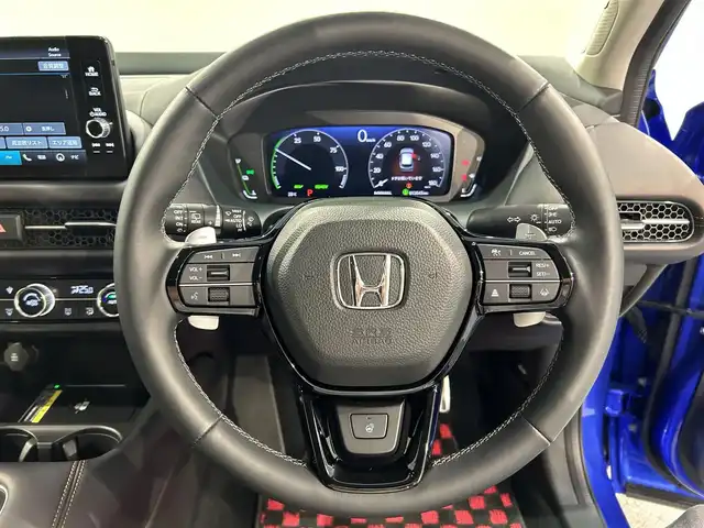 ホンダ ＺＲ－Ｖ ハイブリッド e:HEV Z 愛知県 2023(令5)年 1.2万km プレミアムクリスタルブルークリスタル 純正９型ホンダコネクトナビ　/(FM/AM/USB/Bluetooth/フルセグTV/スマホ連載）/ＢＯＳＥサウンド　/アラウンドビューモニター　/ホンダセンシング　/　　-衝突軽減ブレーキ（CNBS)/　　-誤発進抑制機能/　　-路線逸脱抑制機能/　　-アダプティブクルーズコントロール（ACC)/　　-先行車発進お知らせ機能/　　-標識認識機能/　　-オートハイビーム/　　-ブラインドスポットモニター/　　-パーキングセンサー/ステアリングヒーター　/茶革シート　/ビルトインＥＴＣ２．０　/電動バックドア　/メモリー付パワーシート　/シートヒーター/LEDヘッドライト