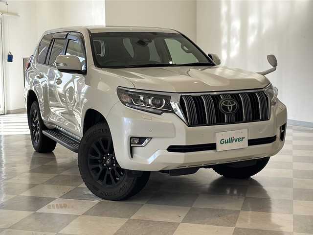 トヨタ ランドクルーザー プラド TX Lパッケージ 福井県 2018(平30)年 8.8万km ホワイトパールクリスタルシャイン ワンオーナー/ムーンルーフ/ソレックスヒッチメンバー/純正7インチSDナビ(NSZT-W66T)/DVD/CD/SD/USB/HDMI/バックカメラ/レーダークルーズコントロール/レーンキープアシスト/コーナーセンサー/オートハイビーム/ETC/フロア格納サードシート（電動）/レザーシート/パワーシート/シートヒーター/エアシート/オートライト/LEDヘッドライト/純正18インチアルミホイール/プッシュスタート/スマートキー×2/ヘッドライトウォッシャー/ステアリングスイッチ