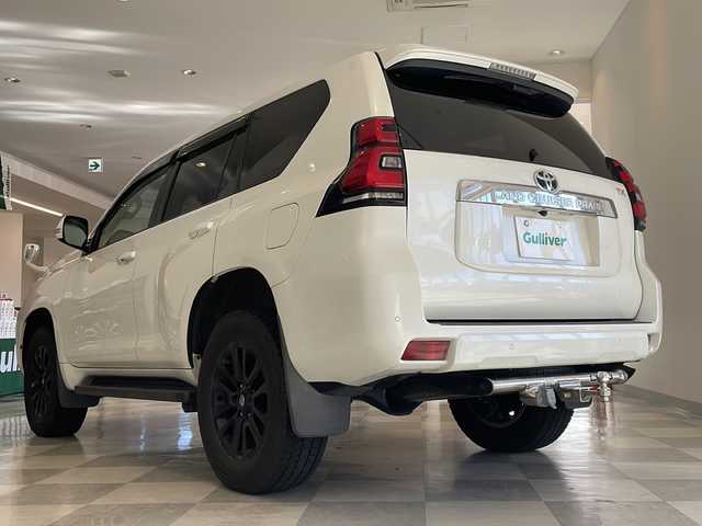 トヨタ ランドクルーザー プラド TX Lパッケージ 福井県 2018(平30)年 8.8万km ホワイトパールクリスタルシャイン ワンオーナー/ムーンルーフ/ソレックスヒッチメンバー/純正7インチSDナビ(NSZT-W66T)/DVD/CD/SD/USB/HDMI/バックカメラ/レーダークルーズコントロール/レーンキープアシスト/コーナーセンサー/オートハイビーム/ETC/フロア格納サードシート（電動）/レザーシート/パワーシート/シートヒーター/エアシート/オートライト/LEDヘッドライト/純正18インチアルミホイール/プッシュスタート/スマートキー×2/ヘッドライトウォッシャー/ステアリングスイッチ