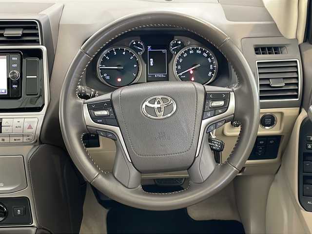 トヨタ ランドクルーザー プラド TX Lパッケージ 福井県 2018(平30)年 8.8万km ホワイトパールクリスタルシャイン ワンオーナー/ムーンルーフ/ソレックスヒッチメンバー/純正7インチSDナビ(NSZT-W66T)/DVD/CD/SD/USB/HDMI/バックカメラ/レーダークルーズコントロール/レーンキープアシスト/コーナーセンサー/オートハイビーム/ETC/フロア格納サードシート（電動）/レザーシート/パワーシート/シートヒーター/エアシート/オートライト/LEDヘッドライト/純正18インチアルミホイール/プッシュスタート/スマートキー×2/ヘッドライトウォッシャー/ステアリングスイッチ