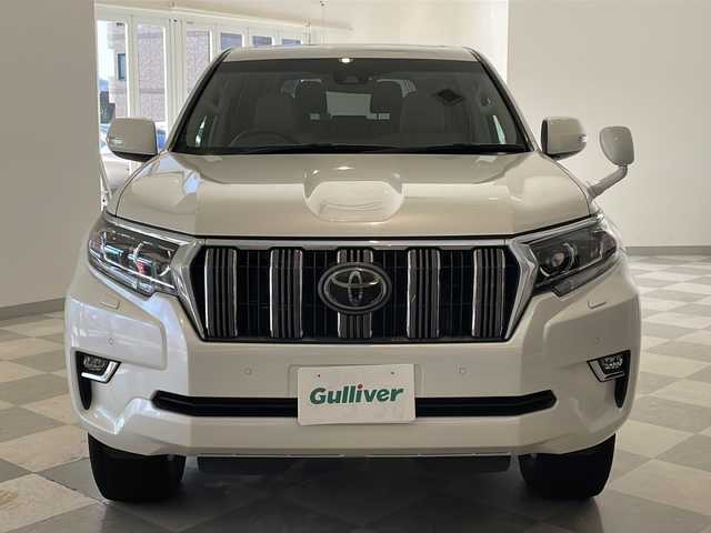 トヨタ ランドクルーザー プラド TX Lパッケージ 福井県 2018(平30)年 8.8万km ホワイトパールクリスタルシャイン ワンオーナー/ムーンルーフ/ソレックスヒッチメンバー/純正7インチSDナビ(NSZT-W66T)/DVD/CD/SD/USB/HDMI/バックカメラ/レーダークルーズコントロール/レーンキープアシスト/コーナーセンサー/オートハイビーム/ETC/フロア格納サードシート（電動）/レザーシート/パワーシート/シートヒーター/エアシート/オートライト/LEDヘッドライト/純正18インチアルミホイール/プッシュスタート/スマートキー×2/ヘッドライトウォッシャー/ステアリングスイッチ