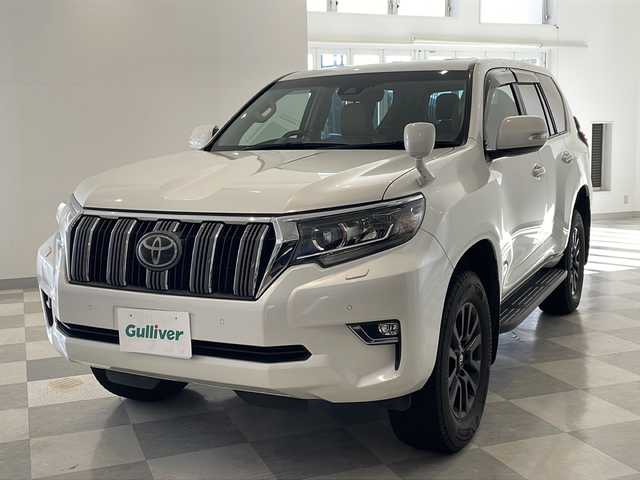 トヨタ ランドクルーザー プラド TX Lパッケージ 福井県 2018(平30)年 8.8万km ホワイトパールクリスタルシャイン ワンオーナー/ムーンルーフ/ソレックスヒッチメンバー/純正7インチSDナビ(NSZT-W66T)/DVD/CD/SD/USB/HDMI/バックカメラ/レーダークルーズコントロール/レーンキープアシスト/コーナーセンサー/オートハイビーム/ETC/フロア格納サードシート（電動）/レザーシート/パワーシート/シートヒーター/エアシート/オートライト/LEDヘッドライト/純正18インチアルミホイール/プッシュスタート/スマートキー×2/ヘッドライトウォッシャー/ステアリングスイッチ