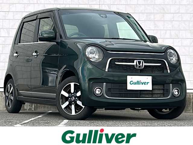 ホンダ Ｎ ＯＮＥ プレミアム 新潟県 2019(令1)年 3.5万km ブリティッシュグリーンP ワンオーナー/衝突軽減ブレーキ/革巻きステアリング/クルーズコントロール/アイドリングストップ/ETC/ハーフレザーシート/ステアリングスイッチ/フルフラットシート/チップアップシート/純正ナビ/（フルセグ、Bluetooth、CD/DVD、AM/FM）/バックカメラ/電動格納ミラー/横滑り防止/カーテンエアバック/キセノンヘッドライト/フォグランプ/スマートキー/純正アルミホイール/純正フロアマット