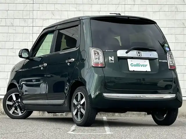 ホンダ Ｎ ＯＮＥ プレミアム 新潟県 2019(令1)年 3.5万km ブリティッシュグリーンP ワンオーナー/衝突軽減ブレーキ/革巻きステアリング/クルーズコントロール/アイドリングストップ/ETC/ハーフレザーシート/ステアリングスイッチ/フルフラットシート/チップアップシート/純正ナビ/（フルセグ、Bluetooth、CD/DVD、AM/FM）/バックカメラ/電動格納ミラー/横滑り防止/カーテンエアバック/キセノンヘッドライト/フォグランプ/スマートキー/純正アルミホイール/純正フロアマット