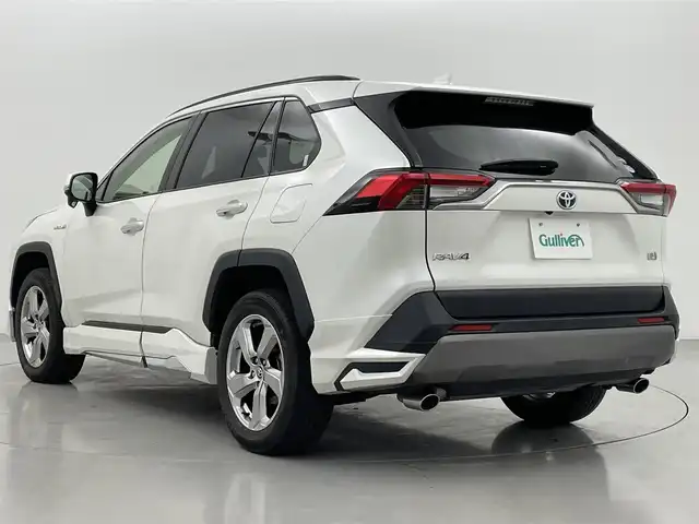 トヨタ ＲＡＶ４ ハイブリッドG 熊本県 2020(令2)年 4.7万km ホワイトパールクリスタルシャイン 禁煙車/純正9型SDナビNSZT-Y68T/【CD・DV・SD・Bluetooth・USB・HDMI】/バックカメラ/ビルトインETC2.0/モデリスタエアロフル/トヨタセーフティーセンス/・プリクラッシュセーフティー/・レーントレーシングアシストポート/・レーダークルーズコントロール/・オートマチックハイビーム/・ロードサインアシスト/・先行車発進告知機能/・インテリジェントクリアランスソナー/・リアクロストラフィックオートブレーキ/・ブラインドスポットモニター/横滑り防止/パワーバックドア/置くだけ充電/D席メモリー付パワーシート/D/N席シートヒーター/ステアリングヒーター/オートライト/LEDヘッドランプ/フロントフォグランプ/純正フロアマット/純正１８インチAW/スマートキー/プッシュスタート/保証書