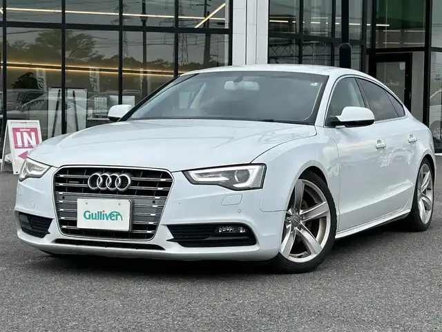 アウディ Ａ５ SB 2．0 TFSI クワトロ 道央・札幌 2013(平25)年 14.5万km グレイシアホワイトメタリック ４WD/純正HDDナビ/AM/FM/CD/DVD/BT/フルセグ/バックカメラ/ETC/プッシュスタート/スマートキー/スペアキー/ステアリングスイッチ/社外レーダー/電格ミラー/ウィンカーミラー/HIDヘッドライト/コーナーセンサー/オートライト/パワーシート/シートヒーター/純正フロアマット