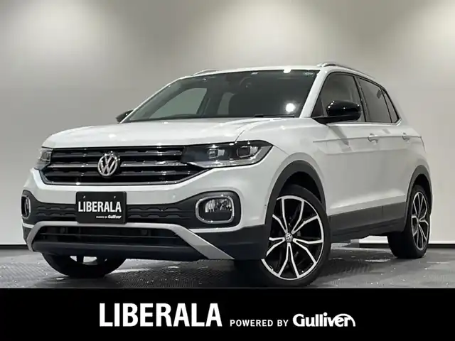 フォルクスワーゲン Ｔ－クロス TSI 1stプラス 新潟県 2020(令2)年 1.8万km ピュアホワイト オールインセーフティ/-アダプティブクルーズコントロール/-ブラインドスポットモニター/-レーンキープアシスト/-リヤビューカメラ/-パーキングアシスト/-リヤトラフィックアラート/純正ナビ/フルセグTV/ETC/ドライブレコーダー/パドルシフト/純正18インチアルミホイール/LEDヘッドライト/スマートキー/ステアリングリモコン