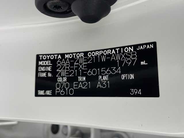 トヨタ カローラツーリング ハイブリッド ダブルバイビー 三重県 2019(令1)年 7.2万km ホワイトパールクリスタルシャイン 禁煙車/純正9インチナビ/（Bluetooth・MiraCast）/バックカメラ/トヨタセーフティセンス/・プリクラッシュセーフティ/・オートマチックハイビーム/・レーントレーシングアシスト/・ロードサインアシスト/・レーダークルーズコントロール/社外フルエアロ/電子パーキング/ブラインドスポットモニター/前席シートヒーター/ステアリングススイッチ/ビルトインETC2.0                                              /スペアタイヤ