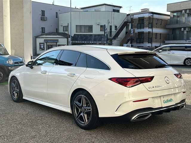 メルセデス・ベンツ Ｍ・ベンツ ＣＬＡ２００ｄ Sブレーク AMGライン 兵庫県 2023(令5)年 1.7万km ポーラホワイト 純正メーカーメモリナビ/  Bluetooth/USB/AM/FM/フルセグテレビ(走行中視聴可能)/純正ビルトインETC2.0/前後ドライブレコーダー/アラウンドビューモニター/ヘッドアップディスプレイ/サンルーフ/パドルシフト/パワーバックドア/パワーシート（D+N席）/シートヒーター（D+N席）/シートメモリ/アイドリングストップ/パーキングアシスト/アダプティブクルーズコントロール/アンチロック・ブレーキ・システム/レーンキープアシスト/前後コーナーセンサー/横滑り防止装置/盗難防止装置/衝突被害軽減システム/パワーステアリング/パワーウィンドウ/純正フロアマット/純正アルミホイール/スマートキー/スペアキー（1本）/エアバッグ（W+サイド）/カーテンエアバッグ/保証書/取扱説明書
