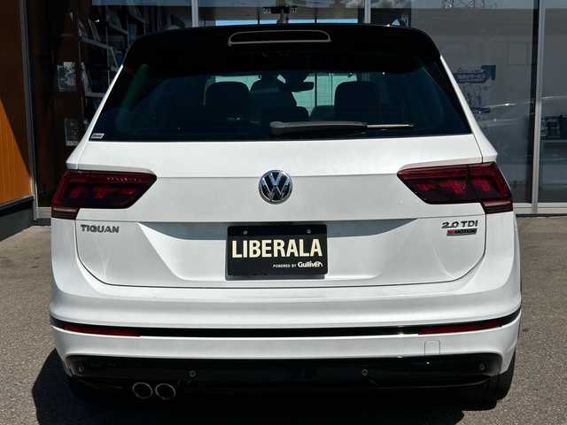 フォルクスワーゲン ティグアン TDI 4モーション Rライン ブラックスタイル 富山県 2018(平30)年 6.8万km 白 純正メモリナビ/Bluetooth接続/フルセグTV/CD/DVD再生/AM/FMラジオ/App-conect/バックカメラ/全方位カメラ/D席メモリ付きパワーシート/D/N席シートヒーター/パワーバックドア/アイドリングストップ/パーキングアシスト/４WD/ヘッドアップディスプレイ/純正19インチAW