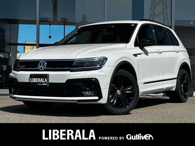 フォルクスワーゲン ティグアン TDI 4モーション Rライン ブラックスタイル 富山県 2018(平30)年 6.8万km 白 純正メモリナビ/Bluetooth接続/フルセグTV/CD/DVD再生/AM/FMラジオ/App-conect/バックカメラ/全方位カメラ/D席メモリ付きパワーシート/D/N席シートヒーター/パワーバックドア/アイドリングストップ/パーキングアシスト/４WD/ヘッドアップディスプレイ/純正19インチAW