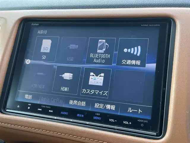 ホンダ ヴェゼル ハイブリッド Z ホンダセンシング 熊本県 2016(平28)年 7.3万km ホワイトオーキッドパール ホンダセンシング/プッシュスタート/純正ナビ/（CD・DVD・フルセグTV・BTオーディオ・SD）/バックカメラ/ビルトインETC/ドライブレコーダー/純正17インチAW/レーダークルーズ/ハーフレザーシート/前席パワーシート・右前席シートメモリー/前席シートヒーター/ルーフレール/LEDヘッドライト/オートライト/LEDフォグライト/横滑り防止装置/ウィンカーミラー/純正フロアマット/純正ドアバイザー/新車保証書/取扱説明書/スマートスペアキー×1本