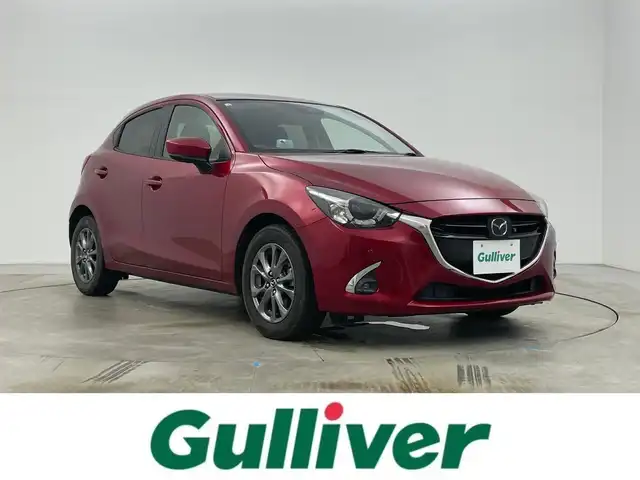 マツダ デミオ 15Sツーリング 岡山県 2018(平30)年 4.2万km ソウルレッドクリスタルM 純正ナビ/・FM/AM/Bluetooth/フルセグ/CD/DVD/360°カメラ/シートヒーター/ETC/衝突軽減ブレーキ/レーンキープアシスト/レーダークルーズコントロール/コーナーセンサー/BSM/MTモード付シフト/LEDヘッドライト/フォグライト/純正15インチアルミ/純正フロアマット