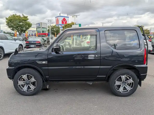 スズキ ジムニー ランドベンチャー 福井県 2017(平29)年 6.6万km ブルーイッシュブラックパール3 ４WD（切り替え式）/社外SDナビ【CN-RA04D】/CD/DVD/BT/USB/SD/フルセグテレビ/バックカメラ/シートヒーター/ETC/前方ドライブレコーダー/レザーシート/ステアリングスイッチ/ダブルエアバッグ/背面タイヤ/リアラダー/マッドガード/スマートキー/ドアバイザー/電動格納ウインカーミラー/純正16インチAW