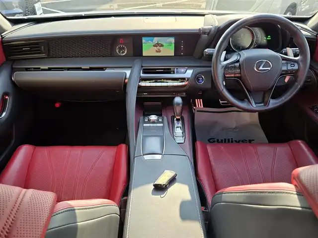 レクサス ＬＣ 500h Lパッケージ 鹿児島県 2021(令3)年 7万km ホワイトノーヴァガラスフレーク マークレビンソン　/ガラスパノラマルーフ　/ヘッドアップディスプレイ　/純正１０．３インチＳＤナビ　/レーダークルーズコントロール/Ｂｌｕｅｔｏｏｔｈオーディオ　/フルセグテレビ　/Ｄ＋Ｎ席シートヒーター　/Ｄ＋Ｎ席ベンチレーション/D+N席パワーシート/ステアリングヒーター/純正アルミホイール(21インチ)/前後純正ドライブレコーダー/プリクラッシュセーフティ/レーンキープアシスト/横滑り防止装置/プッシュスタート/スマートキー/エアバッグ(W+サイド)/カーテンエアバッグ