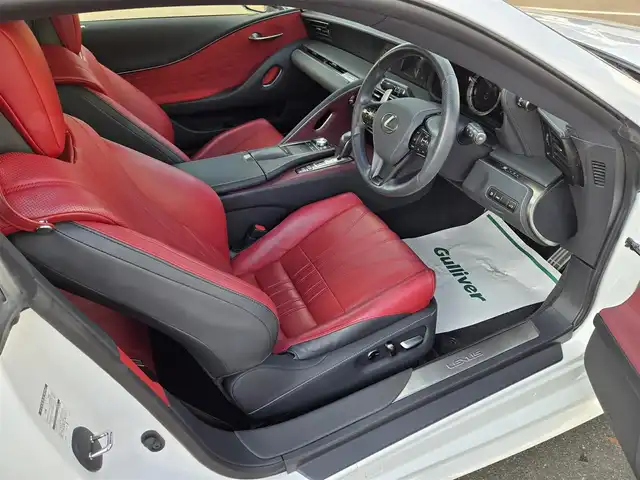 レクサス ＬＣ 500h Lパッケージ 鹿児島県 2021(令3)年 7万km ホワイトノーヴァガラスフレーク マークレビンソン　/ガラスパノラマルーフ　/ヘッドアップディスプレイ　/純正１０．３インチＳＤナビ　/レーダークルーズコントロール/Ｂｌｕｅｔｏｏｔｈオーディオ　/フルセグテレビ　/Ｄ＋Ｎ席シートヒーター　/Ｄ＋Ｎ席ベンチレーション/D+N席パワーシート/ステアリングヒーター/純正アルミホイール(21インチ)/前後純正ドライブレコーダー/プリクラッシュセーフティ/レーンキープアシスト/横滑り防止装置/プッシュスタート/スマートキー/エアバッグ(W+サイド)/カーテンエアバッグ