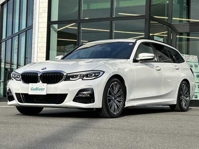 ＢＭＷ ＢＭＷ ３２０ｉ ツーリング Mスポーツ 愛媛県 2021(令3)年 2.8万km アルピンホワイトⅢ 12.3インチマルチディスプレイインターパネル/10.25インチワイドHDDナビ/全周囲/バックカメラ/ミラー一体型ETC/ハーフレザーシート/前席パワーシート（D席メモリ付）/前席シートヒーター/パークディスタンスコントロール/アダプティブLEDヘッドランプ/ハイビームアシスタンス/パーキングアシスト/ワイヤレス充電/ドライビングアシストプロフェッショナル/アクティブクルーズコントロール/純正18インチAW（ランフラット）/スペアキー×１/保証書/取説所