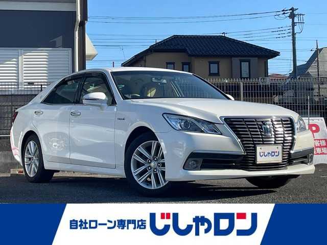 トヨタ クラウン ハイブリッド ロイヤルサルーン 埼玉県 2013(平25)年 14.4万km ホワイトパールクリスタルシャイン (株)IDOMが運営する【じしゃロン川越店】の自社ローン専用車両になります。/こちらは現金またはオートローンご利用時の価格です。/自社ローンご希望の方は別途その旨お申付け下さい/純正ＨＤＤナビ/（AM/FM/CD/DVD/BT)/バックカメラ　/フルセグＴＶ　/ＥＴＣ　/ステアリングスイッチ　/前席パワーシート　/ＨＩＤヘッドライト/クルーズコントロール　/スペアキー　/スマートキー　/ウインカミラー　/電動格納ミラー