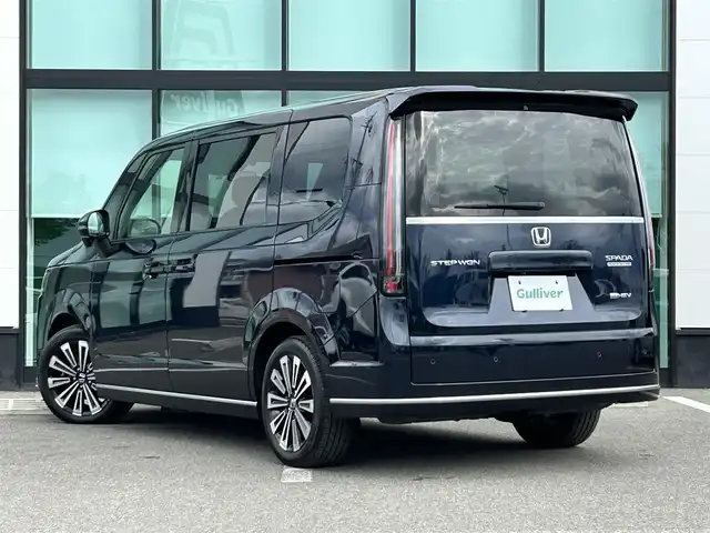 ホンダ ステップワゴン スパーダ eHEV プレミアムライン 和歌山県 2023(令5)年 3.7万km ミッドナイトブルービームM 純正ナビ/フルセグTV/(AM/FM/CD/DVD/USB/Bluetooth)/全方位カメラ/衝突軽減ブレーキ/横滑り防止機能/レーダークルコン/コーナーセンサー/減速セレクター/両側パワースライドドア/シートヒーター/LEDヘッドライト/オートライト/オートマチックハイビーム/アダプティブドライビングビーム/パワーバックドア/2列目オットマン/純正AW