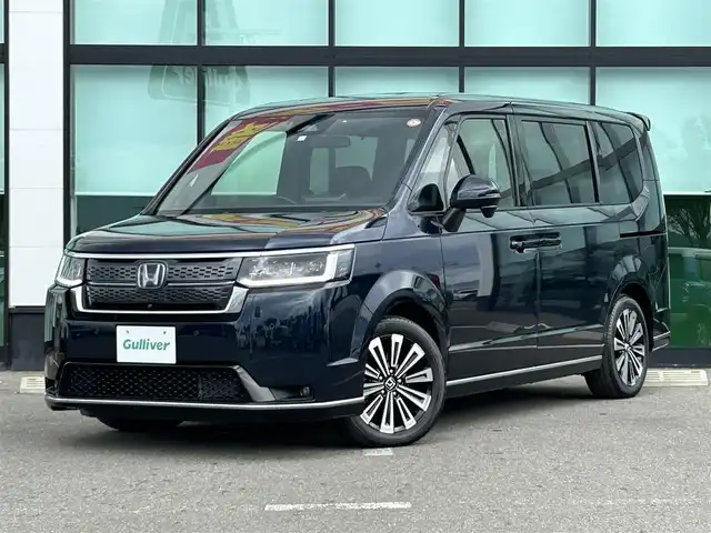 ホンダ ステップワゴン スパーダ eHEV プレミアムライン 和歌山県 2023(令5)年 3.7万km ミッドナイトブルービームM 純正ナビ/フルセグTV/(AM/FM/CD/DVD/USB/Bluetooth)/全方位カメラ/衝突軽減ブレーキ/横滑り防止機能/レーダークルコン/コーナーセンサー/減速セレクター/両側パワースライドドア/シートヒーター/LEDヘッドライト/オートライト/オートマチックハイビーム/アダプティブドライビングビーム/パワーバックドア/2列目オットマン/純正AW
