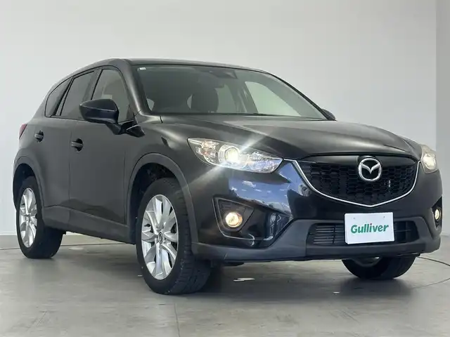 マツダ ＣＸ－５ XD Lパッケージ 愛知県 2014(平26)年 10.5万km ジェットブラックマイカ Ploneerナビ　/（フルセグ／ＢＴ／ＣＤ／ＤＶＤ）　/ＢＯＳＥプレミアムサウンドシステム　/クルーズコントロール　/バックモニター　/運転席パワーシート　/前席シートヒーター　/オートライト　/電動格納ミラー　/ETC　/純正AW