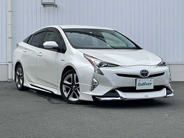 トヨタ プリウス S ツーリングセレクション 三重県 2016(平28)年 4.5万km ホワイトパールクリスタルシャイン 純正9型ナビ/衝突軽減/車線抑制/追従走行/モデリスタエアロ/バックカメラ/シートヒーター(D+N席)/社外ETC/ステアリングスイッチ/オートライト/LEDヘッドライト/フォグライト/禁煙車