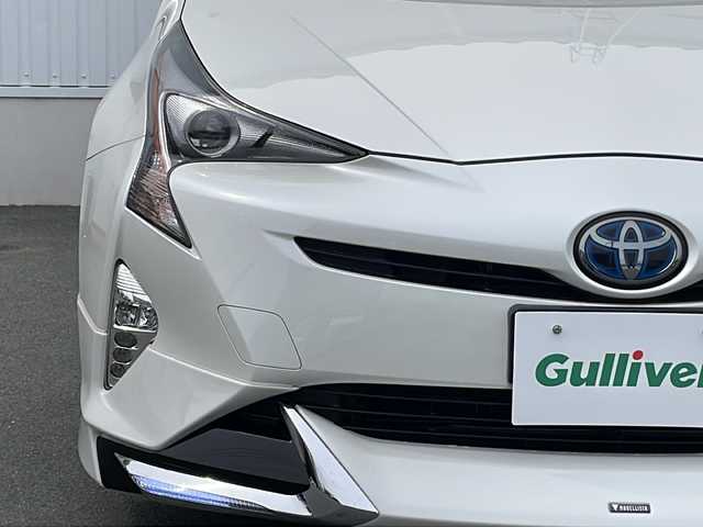 トヨタ プリウス S ツーリングセレクション 三重県 2016(平28)年 4.5万km ホワイトパールクリスタルシャイン 純正9型ナビ/衝突軽減/車線抑制/追従走行/モデリスタエアロ/バックカメラ/シートヒーター(D+N席)/社外ETC/ステアリングスイッチ/オートライト/LEDヘッドライト/フォグライト/禁煙車