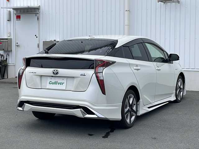 トヨタ プリウス S ツーリングセレクション 三重県 2016(平28)年 4.5万km ホワイトパールクリスタルシャイン 純正9型ナビ/衝突軽減/車線抑制/追従走行/モデリスタエアロ/バックカメラ/シートヒーター(D+N席)/社外ETC/ステアリングスイッチ/オートライト/LEDヘッドライト/フォグライト/禁煙車