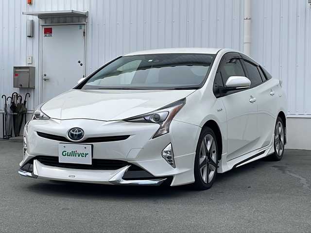 トヨタ プリウス S ツーリングセレクション 三重県 2016(平28)年 4.5万km ホワイトパールクリスタルシャイン 純正9型ナビ/衝突軽減/車線抑制/追従走行/モデリスタエアロ/バックカメラ/シートヒーター(D+N席)/社外ETC/ステアリングスイッチ/オートライト/LEDヘッドライト/フォグライト/禁煙車
