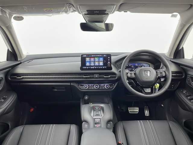 ホンダ ＺＲ－Ｖ ハイブリッド e:HEV Z 愛知県 2025(令7)年 0.1千km パール /禁煙車//純正HondaCONNECTディスプレイ//フルセグTV//ビルトインETC2.0//純正前後ドラレコ//マルチビューカメラシステム//バックカメラ//本革シート//前席パワーシート・シートヒーター//運転席ポジションメモリー//BOSEプレミアムサウンドシステム//ハンズフリーパワーテールゲート//ホンダセンシング//衝突軽減ブレーキ(CMBS)//先行車発進お知らせ//歩行者事故低減ステアリング//路外逸脱抑制機能//標識認識機能//アダプティブクルーズコントロール//レーンキープアシストシステム//トラフィックジャムアシスト//誤発進抑制機能(前後方)//ブラインドスポットインフォメーション//後退出庫サポート//前後パーキングセンサー//オートハイビーム//アダプティブドライビングビーム//LEDヘッドライト//オートライト//ワイヤレス充電器//純正18インチアルミホイール(切削+ベルリナブラック塗装)//革巻きステアリング//ステアリングスイッチ//ステアリングヒーター//パドル減速セレクター//純正フロアマット//プッシュスタート//電動格納ミラーウィンカー//電子パーキングブレーキ//ブレーキホールド