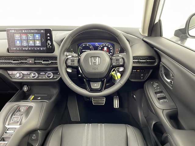 ホンダ ＺＲ－Ｖ ハイブリッド e:HEV Z 愛知県 2025(令7)年 0.1千km パール /禁煙車//純正HondaCONNECTディスプレイ//フルセグTV//ビルトインETC2.0//純正前後ドラレコ//マルチビューカメラシステム//バックカメラ//本革シート//前席パワーシート・シートヒーター//運転席ポジションメモリー//BOSEプレミアムサウンドシステム//ハンズフリーパワーテールゲート//ホンダセンシング//衝突軽減ブレーキ(CMBS)//先行車発進お知らせ//歩行者事故低減ステアリング//路外逸脱抑制機能//標識認識機能//アダプティブクルーズコントロール//レーンキープアシストシステム//トラフィックジャムアシスト//誤発進抑制機能(前後方)//ブラインドスポットインフォメーション//後退出庫サポート//前後パーキングセンサー//オートハイビーム//アダプティブドライビングビーム//LEDヘッドライト//オートライト//ワイヤレス充電器//純正18インチアルミホイール(切削+ベルリナブラック塗装)//革巻きステアリング//ステアリングスイッチ//ステアリングヒーター//パドル減速セレクター//純正フロアマット//プッシュスタート//電動格納ミラーウィンカー//電子パーキングブレーキ//ブレーキホールド