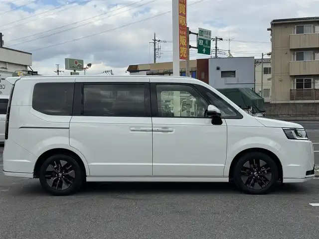 ホンダ ステップワゴン スパーダ eHEV 千葉県 2023(令5)年 3.1万km プラチナホワイトパール ワンオーナー車/ホンダセンシング/衝突軽減ブレーキ/誤発信抑制装置/レーダークルーズコントロール/レーンキープアシスト/ブラインドスポットモニター/純正11インチナビ/フルセグTV/Bluetooth/CarPlay/全方位モニター/両側電動スライドドア/ハーフレザーシート/D/N席シートヒーター/ドライブレコーダー/LEDライト/ETC/保証書・取説/スペアキー