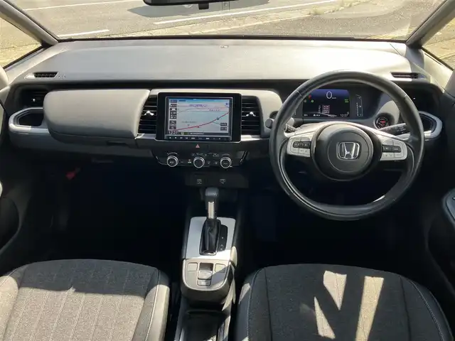 ホンダ フィット e:HEVホーム 広島県 2020(令2)年 4.6万km シャイニンググレーM ワンオーナー/純正ナビ・フルセグTV/ホンダセンシング/ハーフレザーシート/LEDオートライト/バックカメラ/ETC/スマートキー/前後ドライブレコーダー