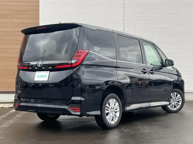 トヨタ ノア S－Z 秋田県 2024(令6)年 1.9万km アティチュードブラックマイカ ４WD/衝突軽減システム/LEDヘッドライト/両側パワースライドドア/純正メモリナビ（DVD/CD/BT/AM/FM）/フルセグ（走行中視聴不可能）/バックカメラ/トヨタ純正１６インチアルミ（夏タイヤ装着）/スマートキー/アイドリングストップ/プッシュスタート/クルーズコントロール追従走行あり/MTモード付AT/オートマチックハイビーム/コーナーセンサー/レーントレーシングアシスト/ステアリングスイッチ/前席シートヒーター/電動パーキングブレーキ/オートブレーキホールド機能/ビルトインETC/社外フロアマット/オートライト/ダブルオートエアコン/パワーステアリング/パワーウィンドウ/ヘッドライトレベライザー/横滑り防止/盗難防止装置/寒冷地仕様/電動格納ウィンカーミラー/保証書/取扱説明書/記録簿/スペアキー×１