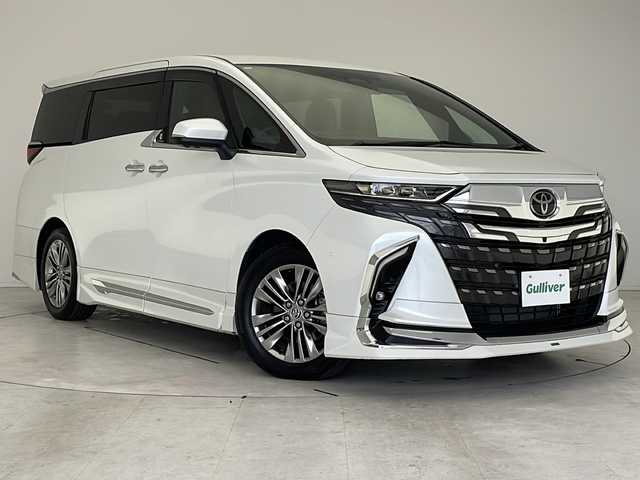 トヨタ アルファードハイブリット Z 愛知県 2024(令6)年 1.1万km プラチナホワイトパールマイカ 衝突軽減システム/モデリスタエアロ/純正ディスプレイオーディオ（ナビあり）/フリップダウンモニター/三眼LEDヘッドライト/全方位カメラ/両側パワースライドドア/Wサンルーフ/レーダークルーズコントロール/シートヒーター/エアシート/フルセグ/CD/DVD/Bluetooth/バックカメラ/電動リアゲート/パワーシート/コーナーセンサー/純正アルミホイール/ETC２．０/ブラインドスポットモニター/パドルシフト/ステアリングヒーター/インテリジェントミラー/リアオートエアコン/オートマチックハイビーム/置くだけ充電器/ドライブレコーダー