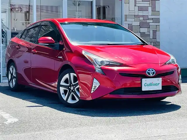 トヨタ プリウス S ツーリングセレクション 徳島県 2016(平28)年 8.5万km エモーショナルレッド ・純正９型ナビ/・バックモニター/・ビルトインＥＴＣ/・純正ドライブレコーダー/・シートヒーター/・純正フロアマット/・ワンオーナー/・純正アルミホイール/・ＬＥＤヘッドライト/・ＤＶＤ再生/・スマートキー/・プッシュスタート