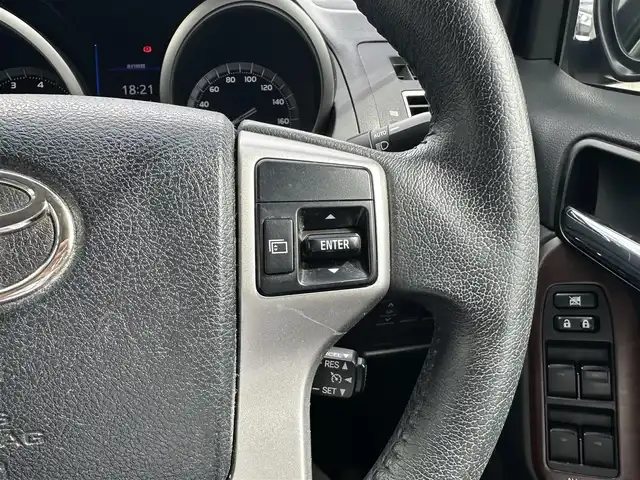 トヨタ ランドクルーザー プラド TX Lパッケージ 愛知県 2016(平28)年 8.3万km ブラック ワンオーナー/4WD/後席フリップダウンモニター/レザーシート/パワーシート/シートヒーター/横滑り防止/純正ビルトインETC/ドアミラーウィンカー/・オートライト/フォグランプ/フロントバンパー（モデリスタ）/保証書/取扱説明書