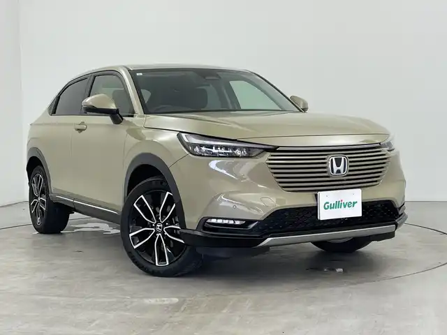 ホンダ ヴェゼル ハイブリッド e:HEV Z 三重県 2021(令3)年 2.8万km サンドカーキパール /禁煙車//純正ディスプレイオーディオ//AM/FM/USB/Bluetooth/フルセグ/AndroidAuto/AppleCarPray//バックモニター//前席シートヒーター//ステアリングヒーター//レーダークルーズコントロール//ブラインドスポットモニター//パワーバックドア//ハーフレザーシート//ホンダセンシング//ワイヤレスチャージャー//オートライト//オートワイパー//スペアキー//純正18インチAW