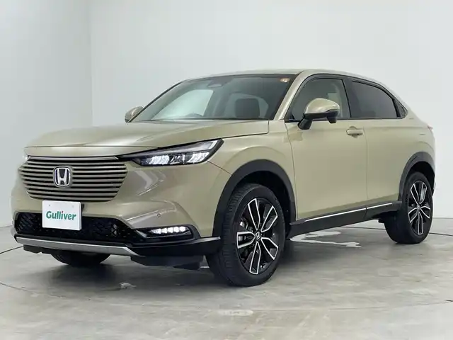 ホンダ ヴェゼル ハイブリッド e:HEV Z 三重県 2021(令3)年 2.8万km サンドカーキパール /禁煙車//純正ディスプレイオーディオ//AM/FM/USB/Bluetooth/フルセグ/AndroidAuto/AppleCarPray//バックモニター//前席シートヒーター//ステアリングヒーター//レーダークルーズコントロール//ブラインドスポットモニター//パワーバックドア//ハーフレザーシート//ホンダセンシング//ワイヤレスチャージャー//オートライト//オートワイパー//スペアキー//純正18インチAW