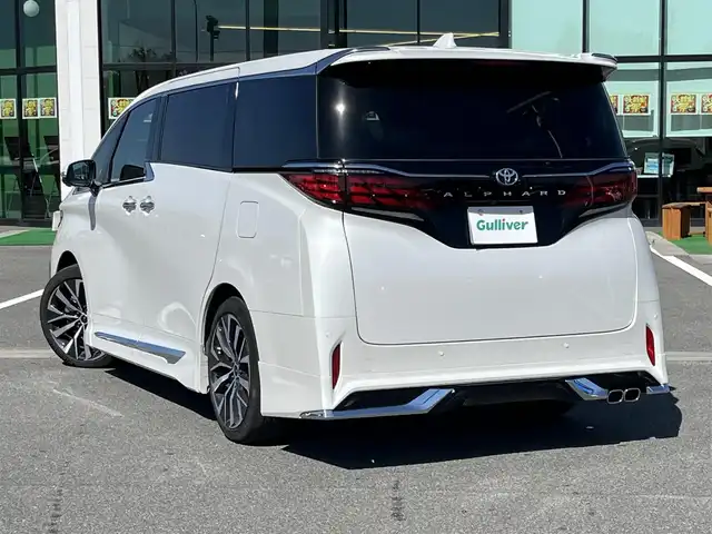 トヨタ アルファード Z 奈良県 2023(令5)年 1.2万km プラチナホワイトパールマイカ ワンオーナー/モデリスタフルエアロ/純正14インチディスプレイオーディオ/（TV/BT/AppleCarPlay/AndroidAuto)/純正12インチフリップダウンモニター/ツインムーンルーフ/レーダークルーズコントロール/パノラミックビューモニター/ブライドスポットモニター/プリクラッシュセーフティ/アドバンスパーク/ブラックレザーシート/両側パワースライドドア/電動リアゲート/運転席メモリーシート/全席パワーシート/全席シートヒーター、エアーシート/ステアリングヒーター/ヘッドアップディスプレイ/オートサンシェード/ワイヤレス充電/デジタルインナーミラー/ＥＴＣ2.0/純正前方ドライブレコーダー(TZ-D204)/モデリスタ20インチＡＷ/保証書/スペアキーＸ１