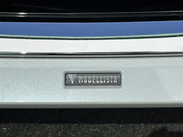 トヨタ アルファード Z 奈良県 2023(令5)年 1.2万km プラチナホワイトパールマイカ ワンオーナー/モデリスタフルエアロ/純正14インチディスプレイオーディオ/（TV/BT/AppleCarPlay/AndroidAuto)/純正12インチフリップダウンモニター/ツインムーンルーフ/レーダークルーズコントロール/パノラミックビューモニター/ブライドスポットモニター/プリクラッシュセーフティ/アドバンスパーク/ブラックレザーシート/両側パワースライドドア/電動リアゲート/運転席メモリーシート/全席パワーシート/全席シートヒーター、エアーシート/ステアリングヒーター/ヘッドアップディスプレイ/オートサンシェード/ワイヤレス充電/デジタルインナーミラー/ＥＴＣ2.0/純正前方ドライブレコーダー(TZ-D204)/モデリスタ20インチＡＷ/保証書/スペアキーＸ１