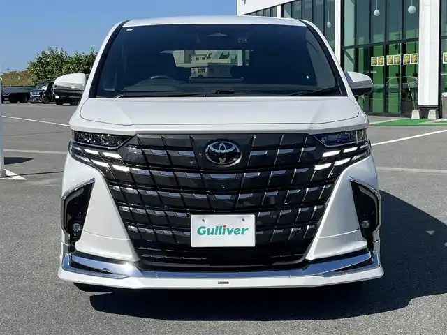 トヨタ アルファード Z 奈良県 2023(令5)年 1.2万km プラチナホワイトパールマイカ ワンオーナー/モデリスタフルエアロ/純正14インチディスプレイオーディオ/（TV/BT/AppleCarPlay/AndroidAuto)/純正12インチフリップダウンモニター/ツインムーンルーフ/レーダークルーズコントロール/パノラミックビューモニター/ブライドスポットモニター/プリクラッシュセーフティ/アドバンスパーク/ブラックレザーシート/両側パワースライドドア/電動リアゲート/運転席メモリーシート/全席パワーシート/全席シートヒーター、エアーシート/ステアリングヒーター/ヘッドアップディスプレイ/オートサンシェード/ワイヤレス充電/デジタルインナーミラー/ＥＴＣ2.0/純正前方ドライブレコーダー(TZ-D204)/モデリスタ20インチＡＷ/保証書/スペアキーＸ１