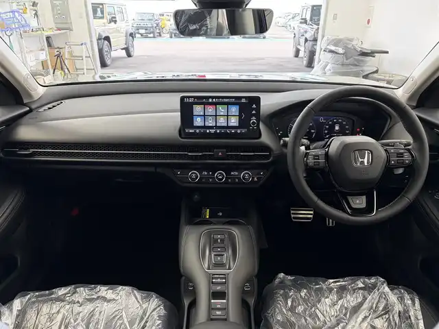ホンダ ＺＲ－Ｖ ハイブリッド e:HEV Z 愛知県 2025(令7)年 0.1千km 黒 登録済未使用車/登録時走行距離8km/ホンダコネクトディスプレイ/Bluetooth/フルセグTV/FM/AM/USB/BOSEプレミアムサウンド/ワイヤレス充電/マルチビューカメラシステム/前席パワーシート/メモリーシート/前席シートヒーター/ブラックレザーシート/ステアリングヒーター/ETC2.0/アダプティブクルーズコントロール/パドルシフト/パワーバックドア/電動パーキングブレーキ/オートブレーキホールド/ダウンヒルアシストコントロール/ブラインドスポットインフォメーション/電動格納ミラー/後席USB/防眩ミラー/純正18インチアルミホイール/純正LEDヘッドライト