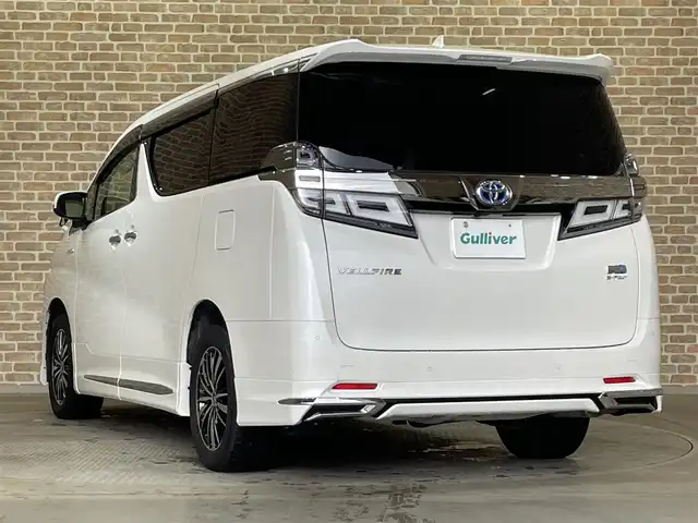 トヨタ ヴェルファイア ハイブリット X 岩手県 2019(令1)年 5.7万km ホワイトパールクリスタルシャイン ４WD/モデリスタエアロ/両側パワースライドドア/ALPINEビッグXナビ１１インチナビ/フルセグTV/トヨタセーフティセンス/プリクラッシュセーフティ/レーダークルーズコントロール/レーントレーシングアシスト/オートマチックハイビーム/クリアランスソナー/先行車発進告知機能/横滑り防止装置/MTモード付AT/レザー調シートカバー/リヤオートエアコン/バックカメラ/サイドカメラ/ETC/ドライブレコーダー/LEDヘッドランプ/LEDフォグランプ/社外１７インチアルミホイール