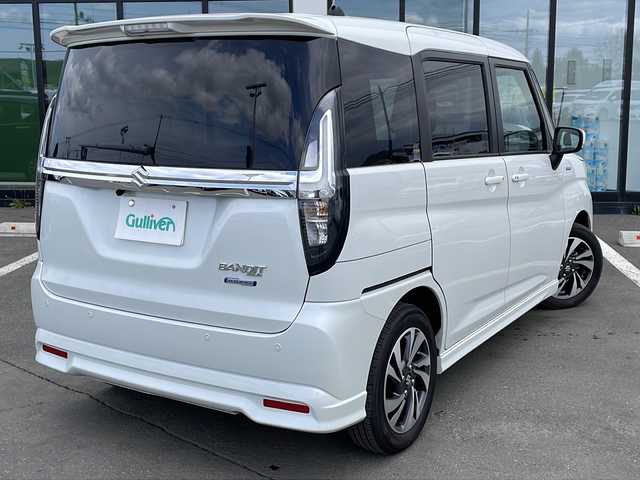 スズキ ソリオ バンディット HV MV 道東・釧路十勝 2024(令6)年 2.4万km ピュアホワイトP ・4WD/・社外SDナビ/（BT・FM・AM・iPod・USB・AUX）/・バックカメラ/・スマートキー×2/・プッシュスタート/・リアパーキングセンサー/・レーダークルーズコントロール/・デュアルカメラサポートブレーキ/・前席シートヒーター/・LEDヘッドライト/・フォグライト/。オートライト/・社外ドライブレコーダー/・横滑り防止/・電格ウィンカーミラー